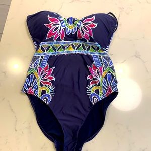 Trina Turk one piece halter strap swimsuit. Woman’s size 14 base color navy blue